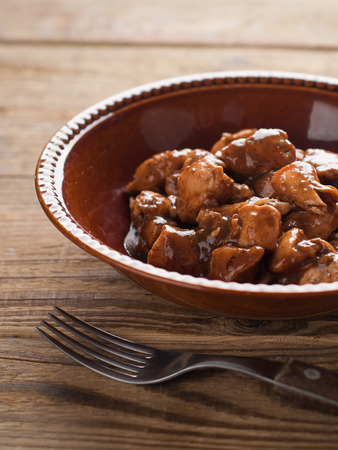 Chicken ragout with onions and sauce, selective focus の写真素材