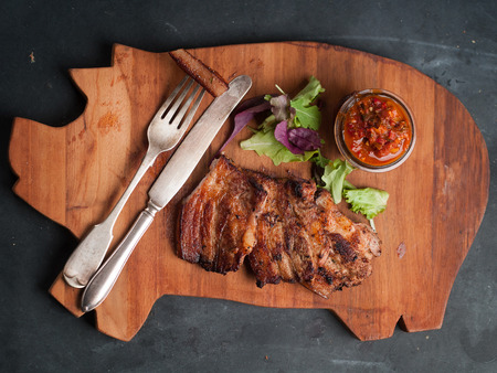 Delicious steak with sauce on board, selective focusの写真素材