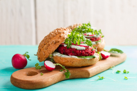 Veggie couscous beet burgers with radish and seedlings, selective focusの写真素材