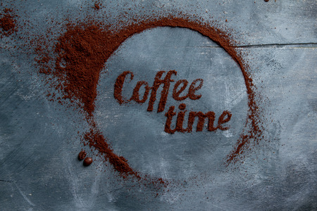 Concept coffee composition on wooden background with copyspace, selective focusの写真素材