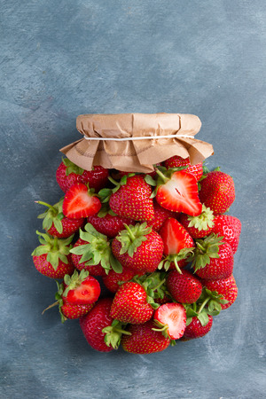 Fresh strawberries like a jar for summer preserves cooking concept, selective focusの写真素材