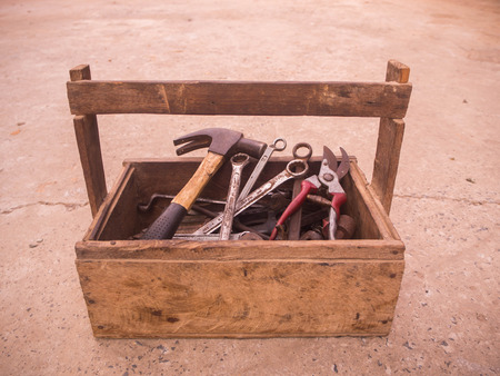 Toolbox with tools. Skrewdriver, hammer, handsaw and wrenchの写真素材