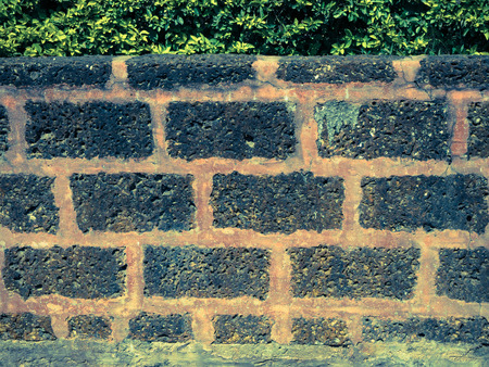 Old grunge brick wall backgroundの写真素材