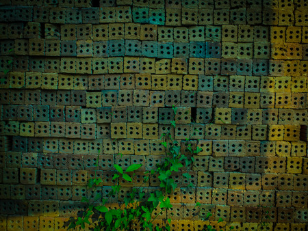 red brick wall texture grunge background with vignetted corners to interior designの写真素材