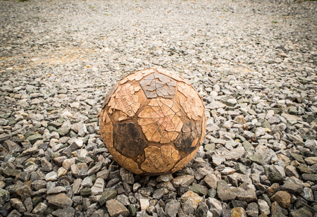 old football on stonesの写真素材