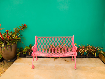 Chair metal park bench in the gardenの写真素材