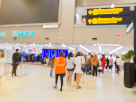 Blured background : terminal departure dheck-in at airport with peopleの写真素材