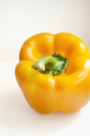 Picture of a yellow pepper against white background.の写真素材
