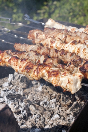 Picture of meat cooking on barbeque grillの写真素材