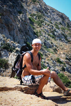 Picture of a young man with backpackの写真素材