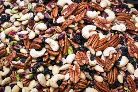 Selection of nuts on the market. Different kinds and sorts of nuts.の写真素材