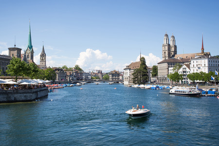 View over the river in Zurich, Switzerland from the bridge on a sunny dayの写真素材