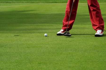 Detail of the golfer on the green.の写真素材