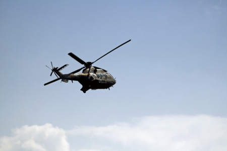 Military helicopter in flight.の写真素材