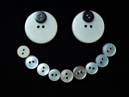 assorted buttons on black backgroundの写真素材