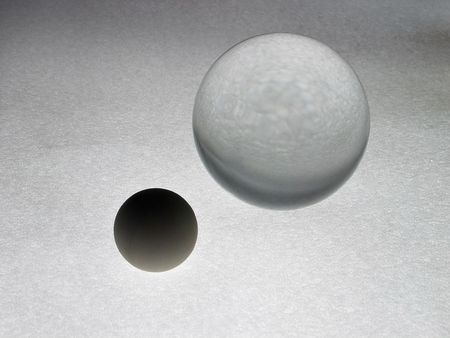 abstraction with two grey balls on grey backgroundの写真素材