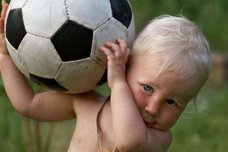 little baby with soccer ballの写真素材