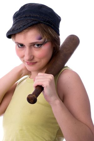 young aggressive woman in t-shirt and cap, with baseball bat in hand, isolated on whiteの写真素材