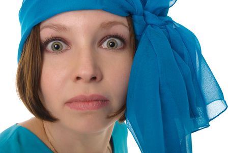 humorous portrait of beautiful woman with blue headscarf, isolated in white backgroundの写真素材