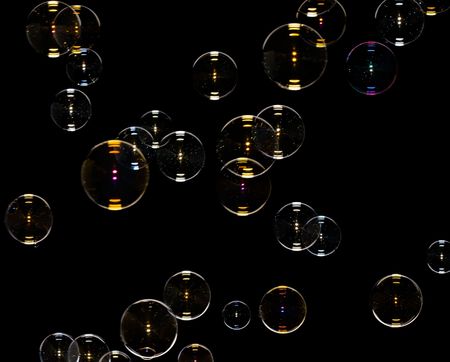 soap bubbles close-up isolated on black background