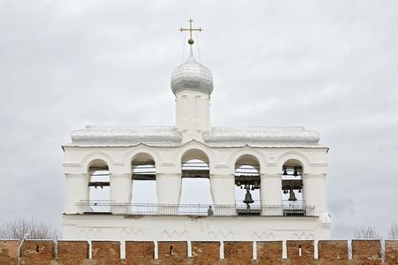 white belfry with church bells in old town of Novgorod, Russia