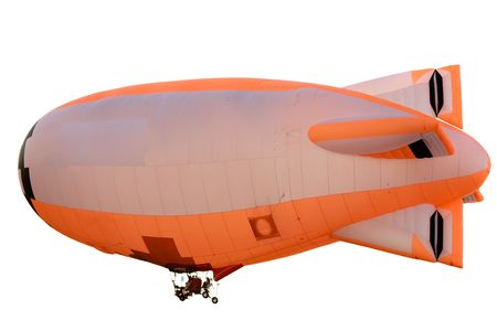 flying orange blimp isolated on white backgroundの写真素材