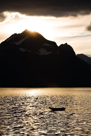 boat in mediterranean sea with mountain background