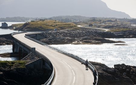 landscape with twisting road between lakes, Atlantic Road, Norwayの写真素材