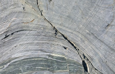 Close-up  of texture of the old cracked flaky stoneの写真素材