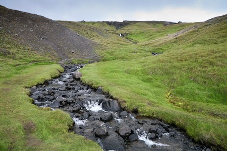 Iceland landscape with small mountain riverの写真素材