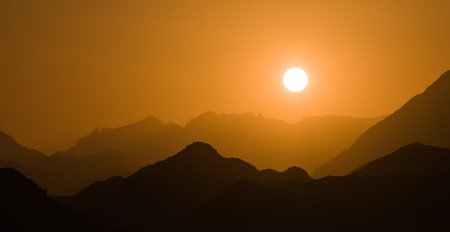 landscape with orange sunset in Egypt mountain desertの写真素材