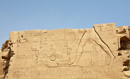 ancient Egyptian bas-reliefs on the wall of Karnak Temple, Egypt, Luxorの写真素材