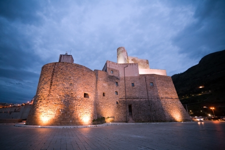 evening view of old medieval fortress of Castellammare del Golfo town, Sicily, Italyのeditorial素材