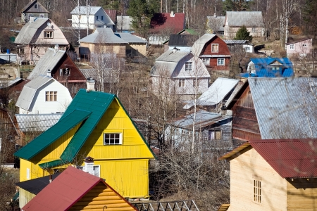 view of suburb settlement in Russia with small wooden housesの写真素材