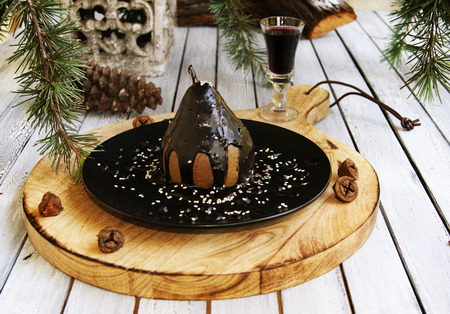 Christmas dessert pear with chocolateの写真素材