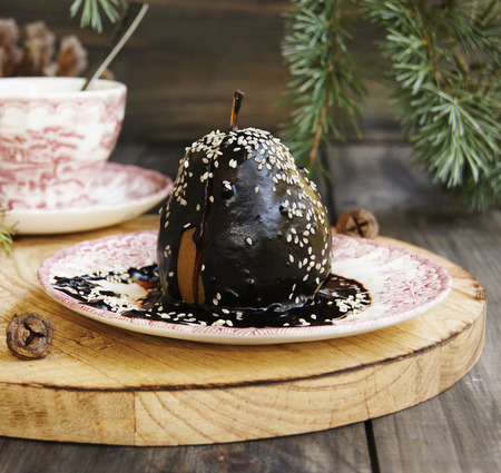 Christmas dessert pear with chocolateの写真素材