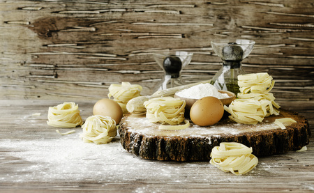A set of products for cooking pasta with wheat flour, a selective focusの写真素材
