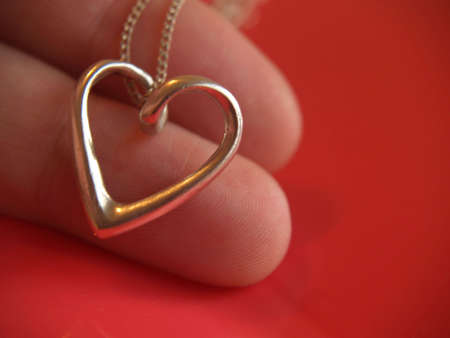 Heart in fingersの写真素材