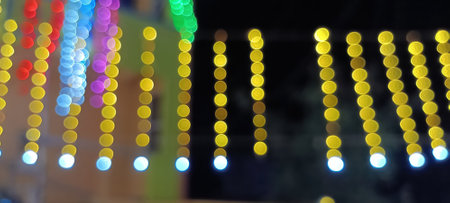 Bright glowing lights of city and traffic under dark light in evening on blurred city lights. light...