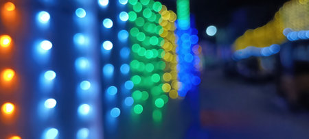 Black background with golden light effects. Horizontal background with blur bokeh effects for...