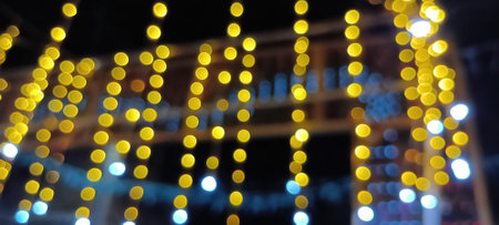 Bright glowing lights of city and traffic under dark light in evening on blurred city lights. light bokeh at night. out focusingの写真素材