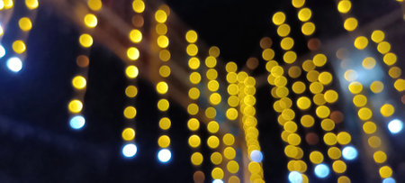 Red glitter vintage lights background. vintage lights background. dark gold and black. defocused Bright glowing lights blurred redの写真素材