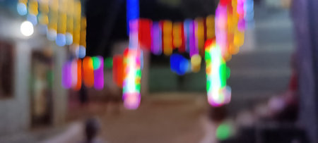 Bright glowing lights of city and traffic under dark light in evening on blurred city lights. light...