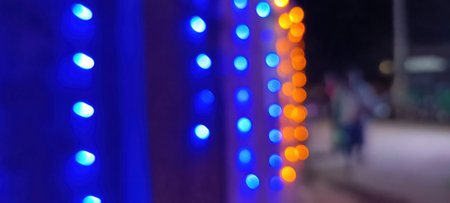 Bright glowing lights of city and traffic under dark light in evening on blurred city lights. light bokeh at night. out focusingの写真素材