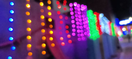 circular reflections of lights abstract blurred of red and gold glittering shine bulbs lights...