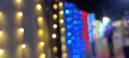 circular reflections of lights abstract blurred of red and gold glittering shine bulbs lights...