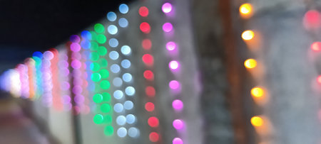 circular reflections of lights abstract blurred of red and gold glittering shine bulbs lights...