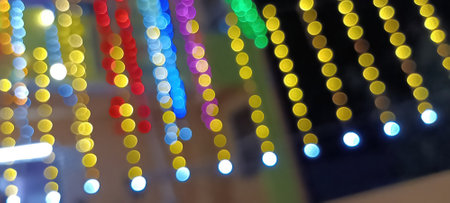 blurred lights of city traffic. Blurred Christmas lights background with festive gold holiday bokeh....