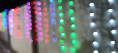 Red glitter vintage lights background. vintage lights background. dark gold and black. defocused...