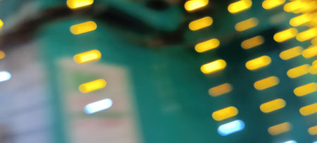 Black background with golden light effects. Horizontal background with blur bokeh effects for...